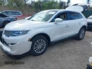 ✅ 2016 Lincoln MKX Select • VIN: 2LMPJ6KR7GBL59266 • Lot: 42044990. Listed on IAAI with 131,233 mi. Free auction sales archive from the USA and detailed vehicle history report at DreamBid. Image 2.