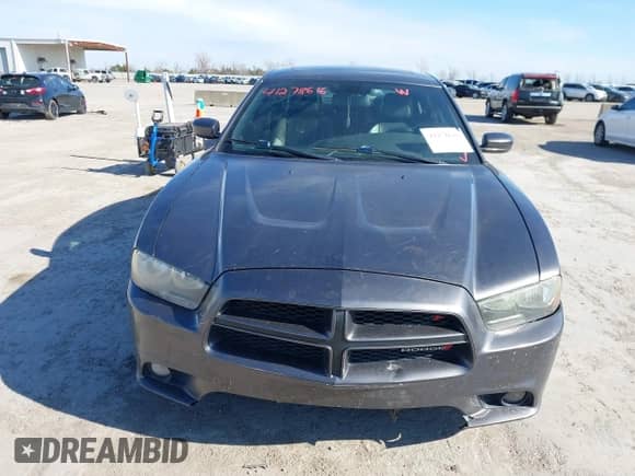 2014 Dodge Charger SXT with VIN 2C3CDXHG2EH256675, listed as a IAAI auction lot 41278616 with 139,709 mi miles and . Bid and sale history available at DreamBid. Image 6.