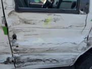 ✅ 2014 Ford Econoline Cargo Commercial • VIN: 1FTNE2EW5EDA53891 • Lot: 67302725. Listed on Copart with 116,432 mi. Free auction sales archive from the USA and detailed vehicle history report at DreamBid. Image 11.