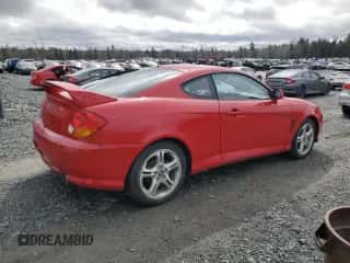 2004 Hyundai Tiburon GT z VIN KMHHN65F24U142204, wystawiony jako Copart lot #50347055 z przebiegiem 128 040 mil mil oraz Czysty tytuł • Clean title. Historia ofert i sprzedaży dostępna na DreamBid. Obrazek 3.