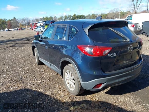 ✅ 2014 Mazda CX-5 Touring • VIN: JM3KE4CY3E0426377 • Lot: 43712899. Wystawiony na IAAI z przebiegiem 96 957 mil. Bezpłatny archiwum sprzedaży aukcyjnych z USA i szczegółowy raport historii pojazdu na DreamBid. Zdjęcie 3.