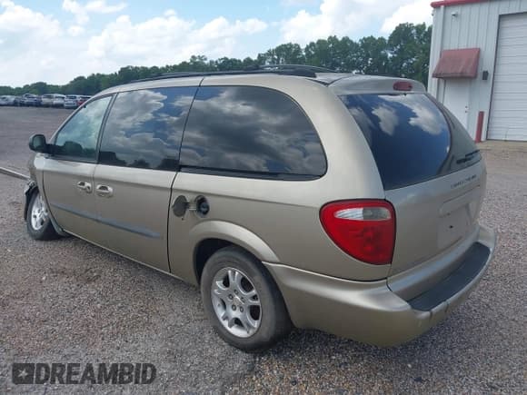 ✅ 2003 Dodge Caravan EX • VIN: 2D4GP74L03R104251 • Lot: 42747705. Listed on IAAI with 323,929 mi. Free auction sales archive from the USA and detailed vehicle history report at DreamBid. Image 3.