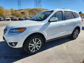 ✅ 2012 Hyundai Santa Fe SE • VIN: 5XYZHDAG9CG104701 • Lot: 87186435. Listed on Copart with 117,628 mi. Free auction sales archive from the USA and detailed vehicle history report at DreamBid. Image 1.
