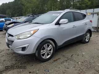 2012 Hyundai Tucson Limited с VIN KM8JUCAC0CU453997, выставлен на аукционе Copart как лот 80983605 с пробегом 220 192 миль миль и Чистый • Clean title. История ставок и продаж доступна на DreamBid. Изображение 1.