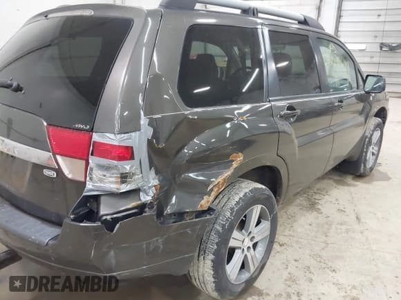 ✅ 2010 Mitsubishi Endeavor SE • VIN: 4A4JN3AS4AE011216 • Lot: 42048644. Wystawiony na IAAI z przebiegiem 176 664 mil. Bezpłatny archiwum sprzedaży aukcyjnych z USA i szczegółowy raport historii pojazdu na DreamBid. Zdjęcie 6.