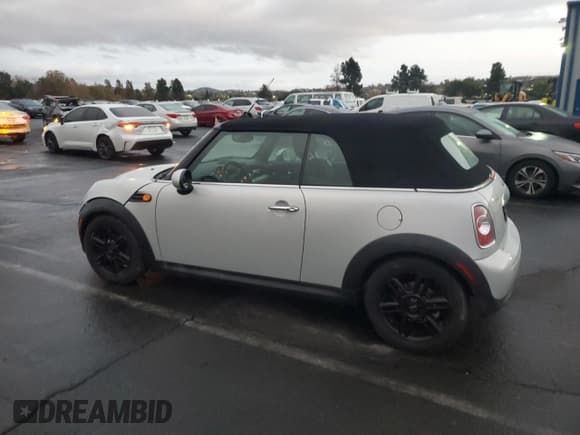 ✅ 2014 MINI Convertible • VIN: WMWZN3C59ET569787 • Lot: 91132095. Listed on Copart with 56,607 mi. Free auction sales archive from the USA and detailed vehicle history report at DreamBid. Image 2.