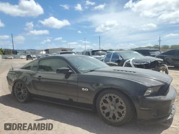 ✅ 2013 Ford Mustang GT • VIN: 1ZVBP8CF5D5284542 • Lot: 69672645. Listed on Copart with 147,030 mi. Free auction sales archive from the USA and detailed vehicle history report at DreamBid. Image 4.