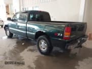 ✅ 2003 GMC Sierra 1500 SLT • VIN: 2GTEK19T531227955 • Lot: 43667157. Listed on IAAI with 320,993 mi. Free auction sales archive from the USA and detailed vehicle history report at DreamBid. Image 3.