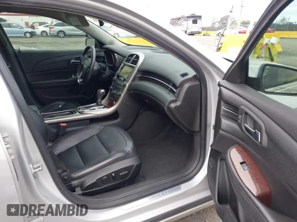 ✅ 2013 Chevrolet Malibu LTZ • VIN: 1G11H5SA0DF245750 • Lot: 43653566. Wystawiony na IAAI z przebiegiem 144 969 mil. Bezpłatny archiwum sprzedaży aukcyjnych z USA i szczegółowy raport historii pojazdu na DreamBid. Zdjęcie 5.