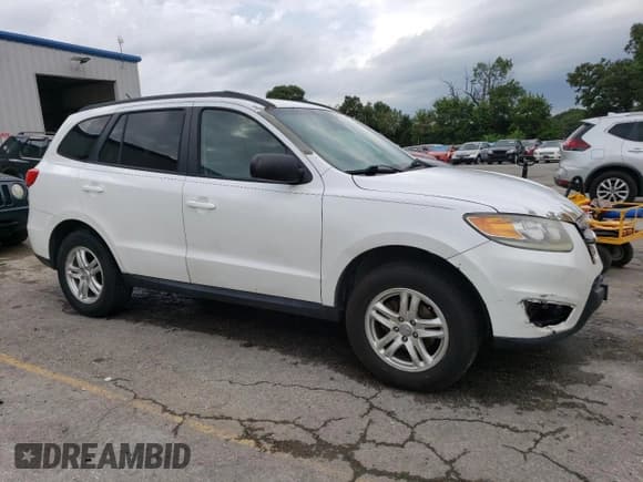 ✅ 2012 Hyundai Santa Fe GLS • VIN: 5XYZGDAB6CG151630 • Lot: 67291054. Listed on Copart with 209,961 mi. Free auction sales archive from the USA and detailed vehicle history report at DreamBid. Image 4.