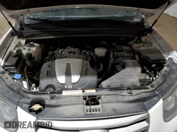 ✅ 2012 Hyundai Santa Fe GLS • VIN: 5XYZGDAG6CG113424 • Lot: 84898144. Listed on Copart with 140,697 mi. Free auction sales archive from the USA and detailed vehicle history report at DreamBid. Image 12.