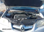 ✅ 2005 Acura MDX Touring • VIN: 2HNYD18895H507273 • Lot: 42900865. Wystawiony na IAAI z przebiegiem 186 398 mil. Bezpłatny archiwum sprzedaży aukcyjnych z USA i szczegółowy raport historii pojazdu na DreamBid. Zdjęcie 10.