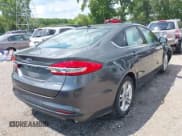 ✅ 2018 Ford Fusion SE • VIN: 3FA6P0HDXJR193777 • Lot: 42926576. Listed on IAAI with 59,726 mi. Free auction sales archive from the USA and detailed vehicle history report at DreamBid. Image 4.