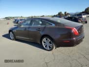 ✅ 2014 Jaguar XJ • VIN: SAJWA1CZ3E8V69877 • Лот: 48159005. Опубликован ранее на Copart с пробегом 57 567 миль. Бесплатный доступ к архиву аукционных продаж из США и подробный отчёт об истории автомобиля на DreamBid. Изображение 2.