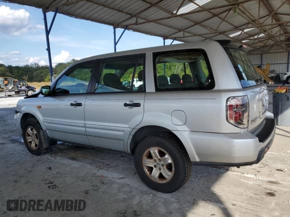 2006 Honda Pilot LX with VIN 5FNYF18116B012124, listed as a Copart auction lot 82311145 with 159,515 mi miles and Salvage title. Bid and sale history available at DreamBid. Image 2.
