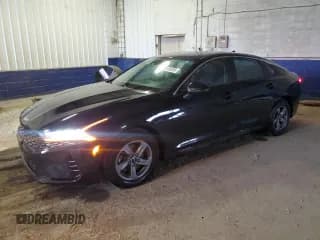 ✅ 2023 Kia K5 LXS • VIN: 5XXG14J24PG197315 • Lot: 80159335. Wystawiony na Copart z przebiegiem 55 127 mil. Bezpłatny archiwum sprzedaży aukcyjnych z USA i szczegółowy raport historii pojazdu na DreamBid. Zdjęcie 1.