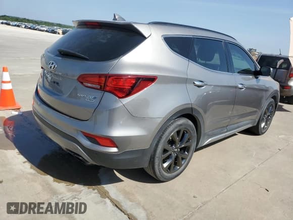 ✅ 2017 Hyundai Santa Fe Ultimate • VIN: 5XYZW4LA8HG401688 • Лот: 53872964. Опубликован ранее на Copart с пробегом 117 274 миль. Бесплатный доступ к архиву аукционных продаж из США и подробный отчёт об истории автомобиля на DreamBid. Изображение 3.