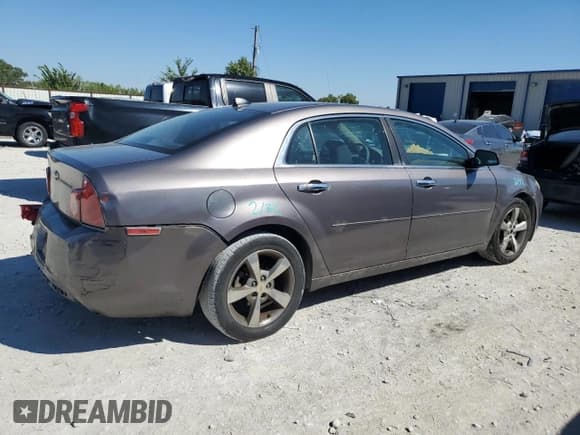 ✅ 2012 Chevrolet Malibu 1LT • VIN: 1G1ZC5E0XCF199119 • Lot: 71044164. Listed on Copart with 179,525 mi. Free auction sales archive from the USA and detailed vehicle history report at DreamBid. Image 3.