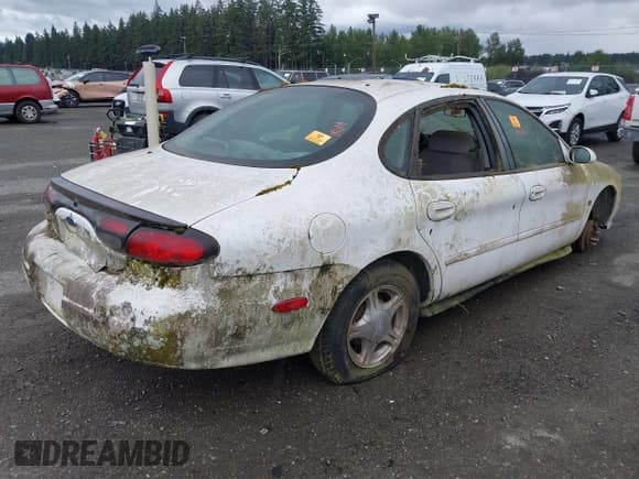 ✅ 1999 Ford Taurus SE Comfort • VIN: 1FAFP53S3XG279886 • Лот: 42916581. Опубликован ранее на IAAI с пробегом 151 514 миль. Бесплатный доступ к архиву аукционных продаж из США и подробный отчёт об истории автомобиля на DreamBid. Изображение 4.