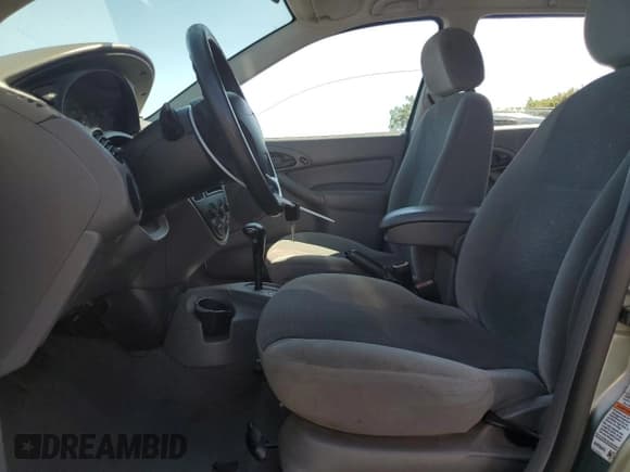 ✅ 2003 Ford Focus • VIN: 1FAHP36Z93W237843 • Lot: 82134115. Listed on Copart with 133,067 mi. Free auction sales archive from the USA and detailed vehicle history report at DreamBid. Image 7.