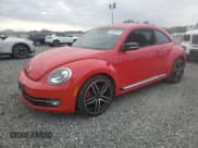 ✅ 2012 Volkswagen Beetle Turbo • VIN: 3VW467AT7CM649911 • Lot: 76279714. Listed on Copart with 117,326 mi. Free auction sales archive from the USA and detailed vehicle history report at DreamBid. Image 1.