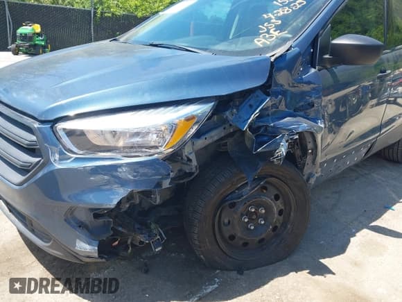 ✅ 2018 Ford Escape S • VIN: 1FMCU0F79JUA63979 • Lot: 42184819. Listed on IAAI with 125,720 mi. Free auction sales archive from the USA and detailed vehicle history report at DreamBid. Image 6.