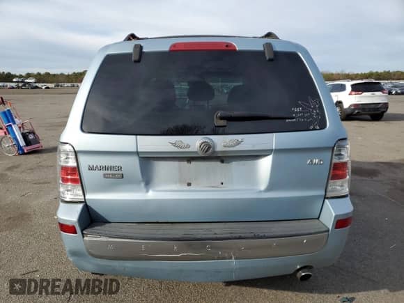 2009 Mercury Mariner Premier with VIN 4M2CU97719KJ17381, listed as a Copart auction lot 80750244 with 115,730 mi miles and Salvage title. Bid and sale history available at DreamBid. Image 6.