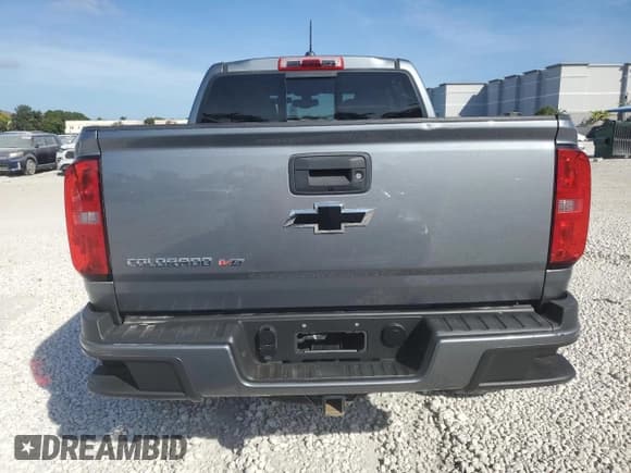 ✅ 2018 Chevrolet Colorado 4WD Z71 • VIN: 1GCGTDEN6J1288071 • Лот: 81923664. Опубликован ранее на Copart с пробегом 118 372 миль. Бесплатный доступ к архиву аукционных продаж из США и подробный отчёт об истории автомобиля на DreamBid. Изображение 6.