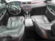 2009 Chevrolet Impala LT with VIN 2G1WC57M091316385, listed as a Copart auction lot 71391055 with 207,854 mi miles and Salvage title. Bid and sale history available at DreamBid. Image 8.