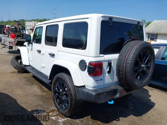✅ 2023 Jeep Wrangler Sahara • VIN: 1C4JJXP6XPW537180 • Lot: 42709330. Listed on IAAI with 31,251 mi. Free auction sales archive from the USA and detailed vehicle history report at DreamBid. Image 3.