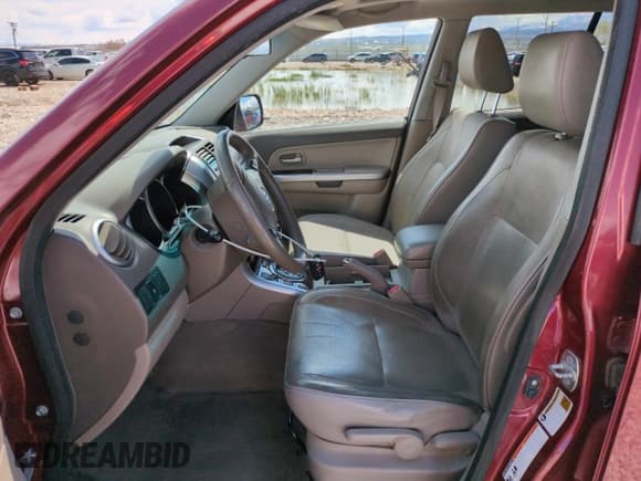 ✅ 2007 Suzuki Grand Vitara Luxury • VIN: JS3TE947474202306 • Lot: 52448755. Wystawiony na Copart z przebiegiem 98 456 mil. Bezpłatny archiwum sprzedaży aukcyjnych z USA i szczegółowy raport historii pojazdu na DreamBid. Zdjęcie 7.