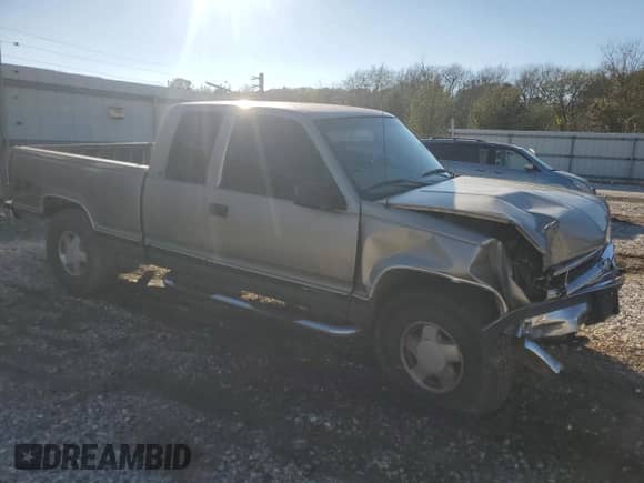 1999 Chevrolet Silverado 1500 with VIN 1GCEK19R8XR132050, listed as a Copart auction lot 79560564 with 237,500 mi miles and Clean title. Bid and sale history available at DreamBid. Image 4.