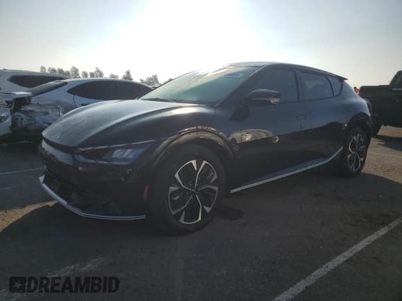 ✅ 2022 Kia EV6 Wind • VIN: KNDC34LA6N5043171 • Лот: 91899085. Опубликован ранее на Copart с пробегом 65 725 миль. Бесплатный доступ к архиву аукционных продаж из США и подробный отчёт об истории автомобиля на DreamBid. Изображение 1.