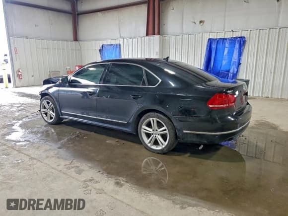 ✅ 2014 Volkswagen Passat SEL Premium • VIN: 1VWCN7A32EC046318 • Lot: 94334875. Listed on Copart with 110,181 mi. Free auction sales archive from the USA and detailed vehicle history report at DreamBid. Image 2.