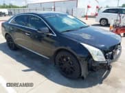 ✅ 2014 Cadillac XTS Livery • VIN: 2G61U5S39E9326134 • Lot: 42615652. Listed on IAAI with 228,392 mi. Free auction sales archive from the USA and detailed vehicle history report at DreamBid. Image 1.