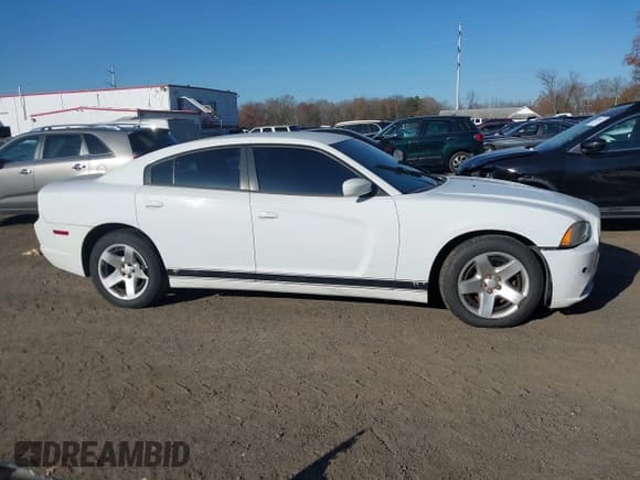✅ 2014 Dodge Charger Police • VIN: 2C3CDXAT2EH350711 • Lot: 43688159. Listed on IAAI with 128,318 mi. Free auction sales archive from the USA and detailed vehicle history report at DreamBid. Image 13.