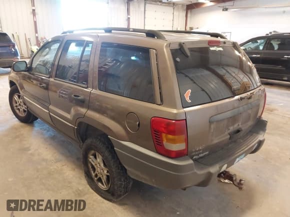 ✅ 2002 Jeep Grand Cherokee Laredo • VIN: 1J4GW48S82C110008 • Lot: 43538286. Listed on IAAI with 262,351 mi. Free auction sales archive from the USA and detailed vehicle history report at DreamBid. Image 3.