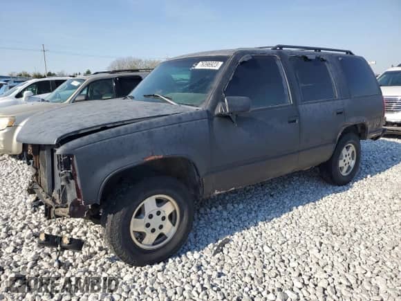 1996 Chevrolet Tahoe with VIN 1GNEK13R2TJ345259, listed as a Copart auction lot 78396923 with 184,570 mi miles and Salvage title. Bid and sale history available at DreamBid. Image 1.