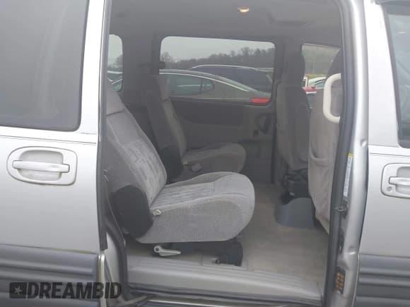 ✅ 2002 Pontiac Montana w/1SE Pkg • VIN: 1GMDX13E42D323291 • Lot: 41039579. Wystawiony na IAAI z przebiegiem 334 937 mil. Bezpłatny archiwum sprzedaży aukcyjnych z USA i szczegółowy raport historii pojazdu na DreamBid. Zdjęcie 8.