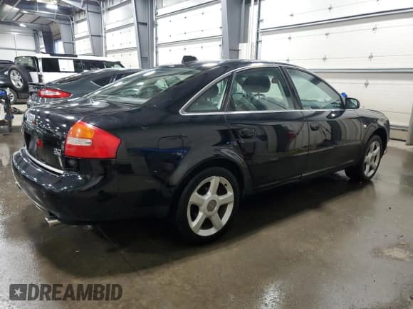 ✅ 2004 Audi A6 3.0L • VIN: WAULT64B64N005115 • Lot: 84074454. Listed on Copart with 127,679 mi. Free auction sales archive from the USA and detailed vehicle history report at DreamBid. Image 3.