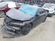 ✅ 2023 Honda Civic Sport • VIN: 2HGFE2F56PH521743 • Lot: 42205210. Listed on IAAI with 31,462 mi. Free auction sales archive from the USA and detailed vehicle history report at DreamBid. Image 2.