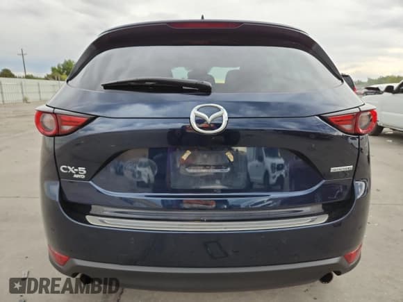 ✅ 2020 Mazda CX-5 Grand Touring Reserve • VIN: JM3KFBAY3L0835397 • Lot: 83859775. Listed on Copart with 29,679 mi. Free auction sales archive from the USA and detailed vehicle history report at DreamBid. Image 6.