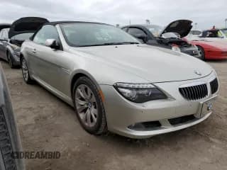 ✅ 2009 BMW 6 Series 650i • VIN: WBAEB53599CX64829 • Лот: 75694824. Опубликован ранее на Copart с пробегом Не указан. Бесплатный доступ к архиву аукционных продаж из США и подробный отчёт об истории автомобиля на DreamBid. Изображение 4.
