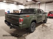 ✅ 2022 Toyota Tacoma SR • VIN: 3TMCZ5AN5NM519589 • Lot: 43634877. Listed on IAAI with 48,814 mi. Free auction sales archive from the USA and detailed vehicle history report at DreamBid. Image 4.