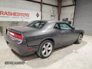✅ 2014 Dodge Challenger SXT • VIN: 2C3CDYAG9EH133472 • Lot: 44821425. Wystawiony na Copart z przebiegiem 132 298 mil. Bezpłatny archiwum sprzedaży aukcyjnych z USA i szczegółowy raport historii pojazdu na DreamBid. Zdjęcie 3.
