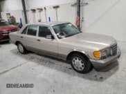 ✅ 1990 Mercedes-Benz 560 • VIN: WDBCA39E7LA517710 • Lot: 85307074. Listed on Copart with 225,233 mi. Free auction sales archive from the USA and detailed vehicle history report at DreamBid. Image 4.
