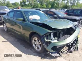 2022 Dodge Charger SXT with VIN 2C3CDXBG4NH197346, listed as a IAAI auction lot 42932630 with 51,412 mi miles and . Bid and sale history available at DreamBid. Image 1.