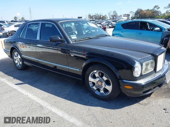 ✅ 2001 Bentley Arnage • VIN: SCBLC31E11CX06297 • Lot: 41980275. Wystawiony na IAAI z przebiegiem 63 510 mil. Bezpłatny archiwum sprzedaży aukcyjnych z USA i szczegółowy raport historii pojazdu na DreamBid. Zdjęcie 1.