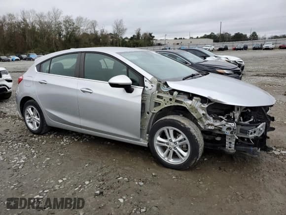 ✅ 2018 Chevrolet Cruze LT • VIN: 3G1BE6SM4JS604182 • Lot: 71157182. Listed on Copart with 23,717 mi. Free auction sales archive from the USA and detailed vehicle history report at DreamBid. Image 4.