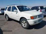 ✅ 1999 Isuzu Rodeo S • VIN: 4S2CK58W7X4325703 • Lot: 42715480. Listed on IAAI with 205,420 mi. Free auction sales archive from the USA and detailed vehicle history report at DreamBid. Image 6.